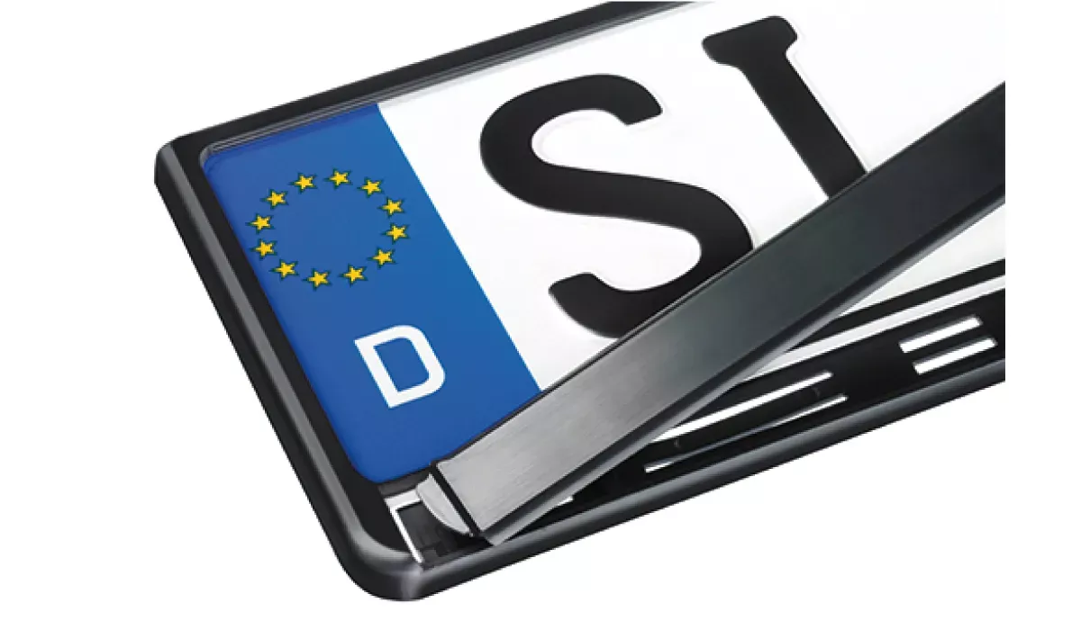 Promotional license plates holder with foil inscription