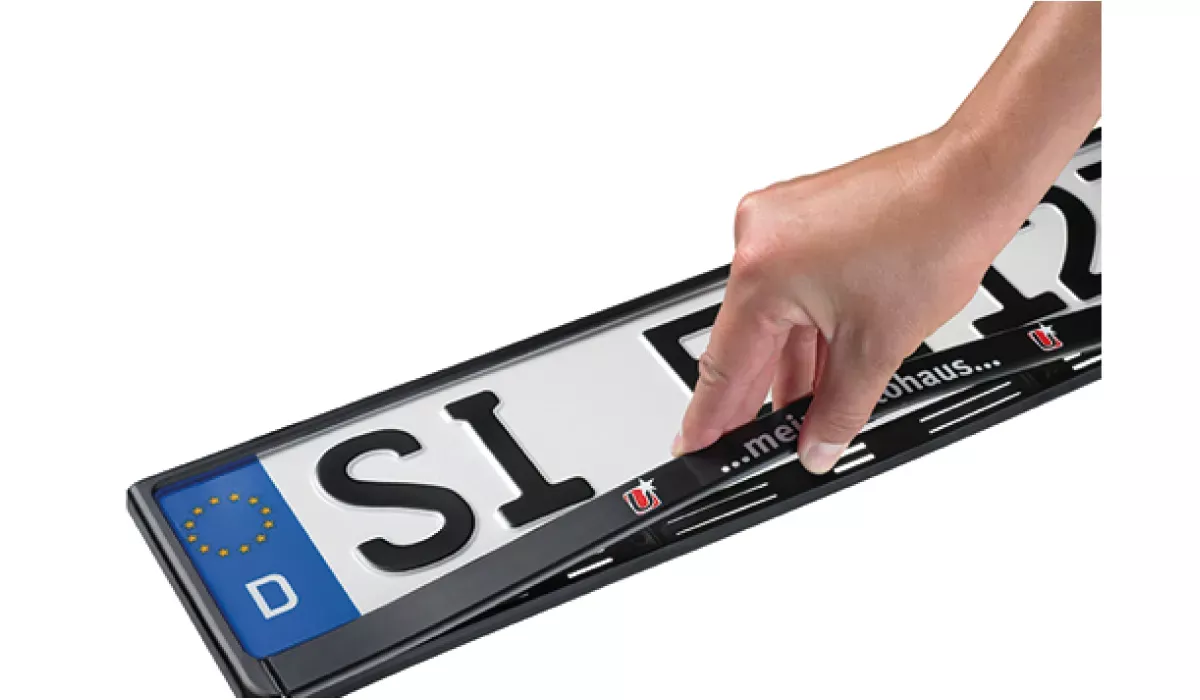 Promotional license plates holder with foil inscription