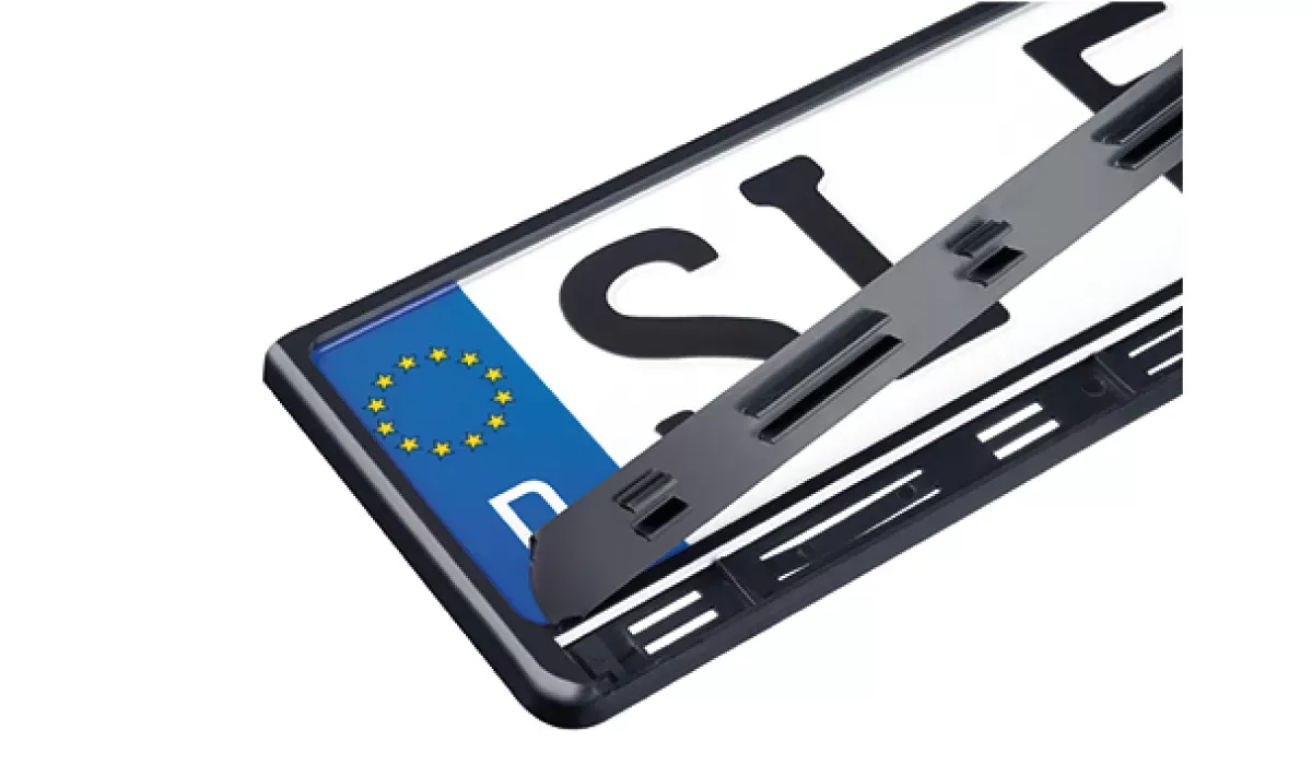 Promotional license plates holder with foil inscription