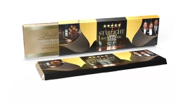 Lindt alpine whole milk extra bar in an advertising slipcase